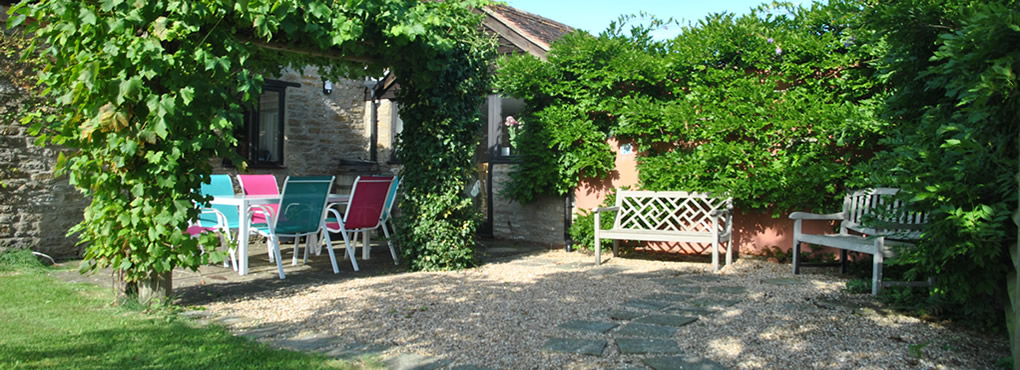 Sunny south facing patio with plenty of garden furniture